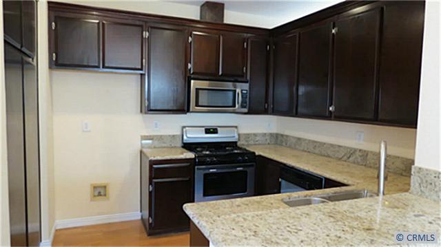 Granite counter tops with stainless appliances - 28301 PASEO EL SIENA 12, Laguna Niguel CA 92677 - photo 1