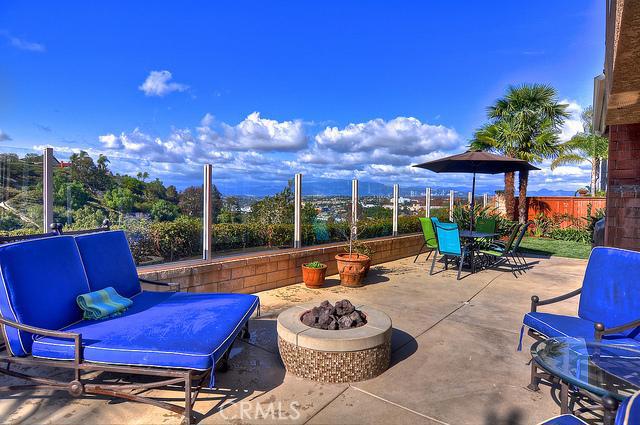Lounge at night next to this fire pit as you take in the city light views and feel the ambiance set by the sparkling mov - 28621 Vista Ladera, Laguna Niguel CA 92677 - photo 1