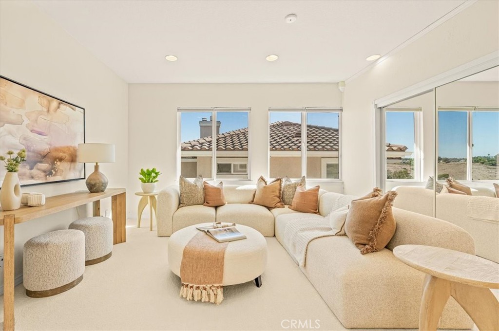 A bright, inviting loft with sweeping views through walls of windows. - 28932 Drakes Bay, Laguna Niguel CA 92677 - photo 44