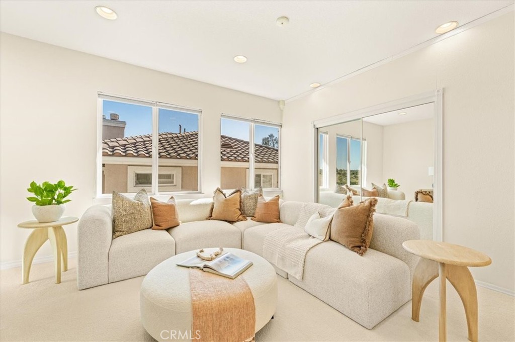 A light-filled loft with a mirrored closet, offering effortless versatility as an additional bedroom suite or a sophisti - 28932 Drakes Bay, Laguna Niguel CA 92677 - photo 45