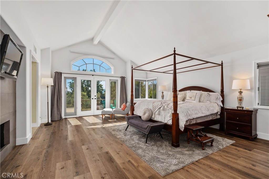 Primary bedroom with vaulted ceilings and deck! - 29 Bridington, Laguna Niguel CA 92677 - photo 23