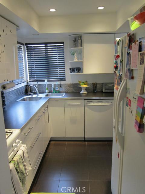 Remodeled kitchen with recessed lighting, corner window sink, lots of cabinets - 29053 Via Cerrito 58, Laguna Niguel CA 92677 - photo 1