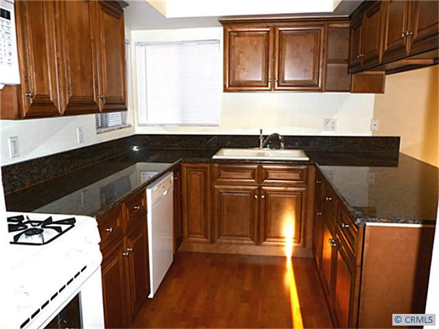 Remodeled Kitchen with new cabinets, granite counters, sink, stove/oven. - 29085 VIA CERRITO 45, Laguna Niguel CA 92677 - photo 1