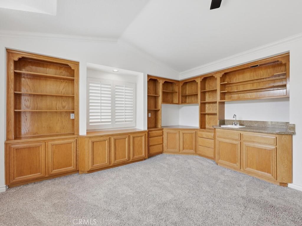 Bonus room has built in shelving and wet bar - 29352 Clipper Way, Laguna Niguel CA 92677 - photo 27