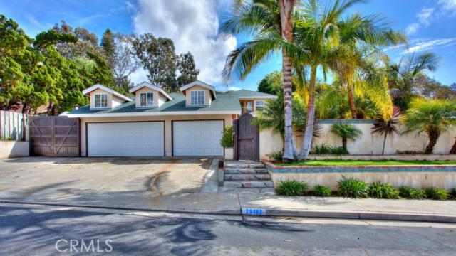 Front of home with large 4 car driveway, oversized 3 car garage, gated side yard with room for a large RV or boat. The h - 29482 Via San Sebastian, Laguna Niguel CA 92677 - photo 1