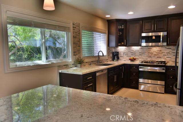 Another view of this amazing kitchen with huge granite island! - 29592 Deervale Circle, Laguna Niguel CA 92677 - photo 1