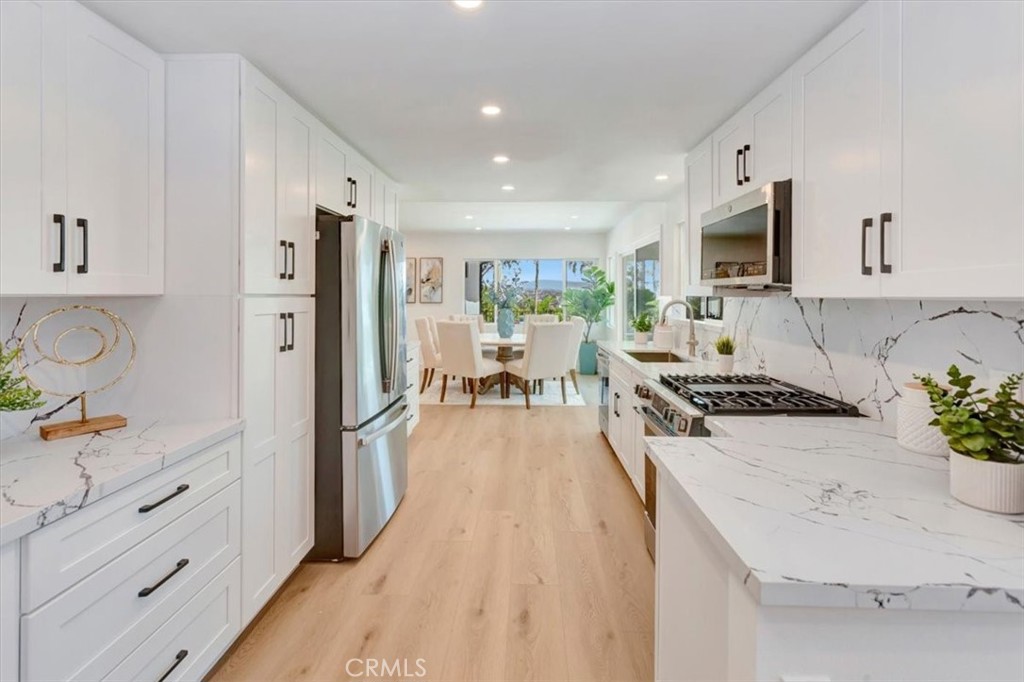QUARTS COUNTERS AND SOFT CLOSING CABINETS AND DRAWERS - 29642 Colebrook Drive, Laguna Niguel CA 92677 - photo 13