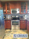 ALL NEW REMODELED KITCHEN. BEAUTIFUL CUSTOM CABINETS, GRANITE COUNTERS AND FLOORING. - 29642 PELICAN Way, Laguna Niguel CA 92677 - photo 1