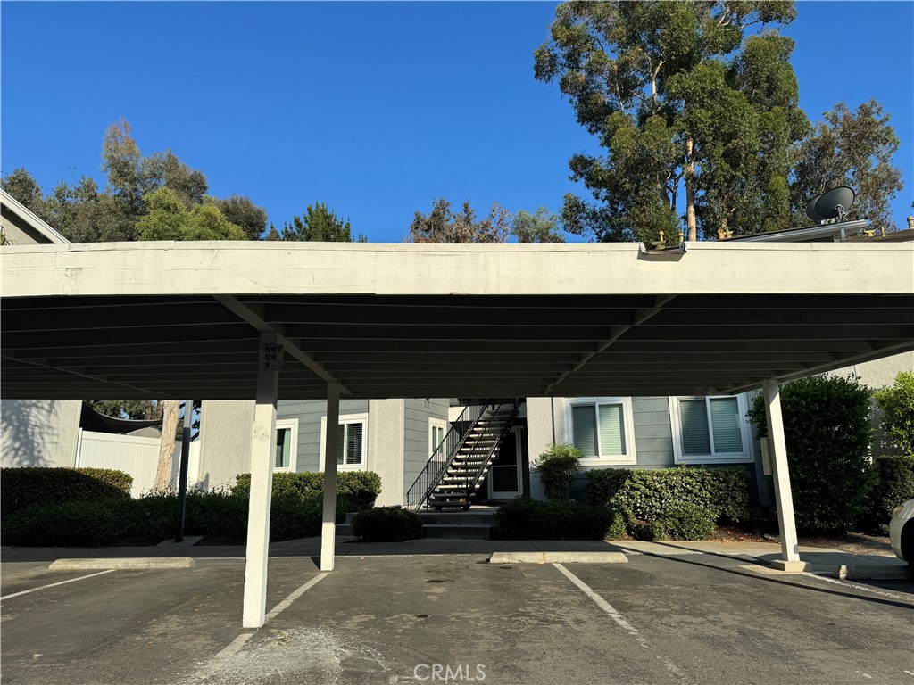 Carport parking space is in front of the apartment building. - 29766 Sea Shore Lane 56, Laguna Niguel CA 92677 - photo 1