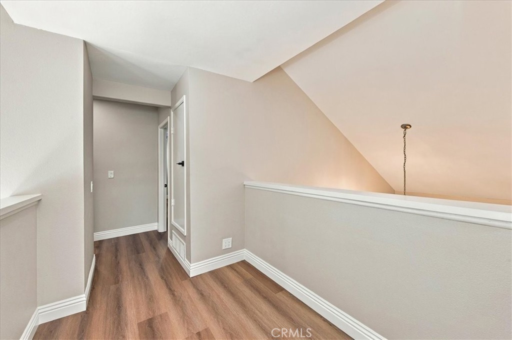 Upstairs hallway between master and secondary rooms - 29852 Running Deer, Laguna Niguel CA 92677 - photo 33