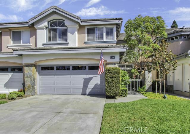 Curb appeal coupled with a FULL SIZED driveway...a rarity in this area! - 30 Stoney Pointe, Laguna Niguel CA 92677 - photo 1