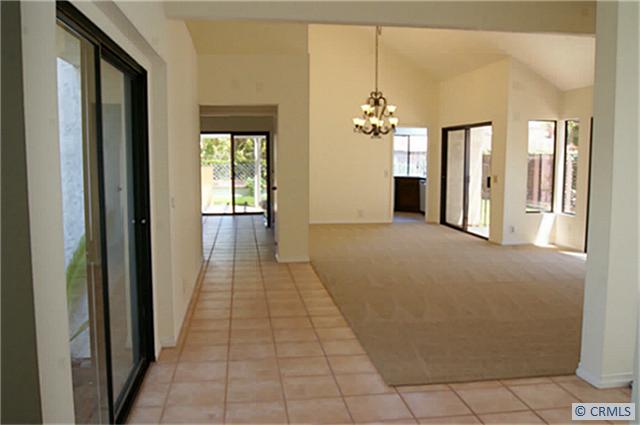 your formal living and dining rooms surrounding your atrium - 30012 RUNNING DEER Lane, Laguna Niguel CA 92677 - photo 1
