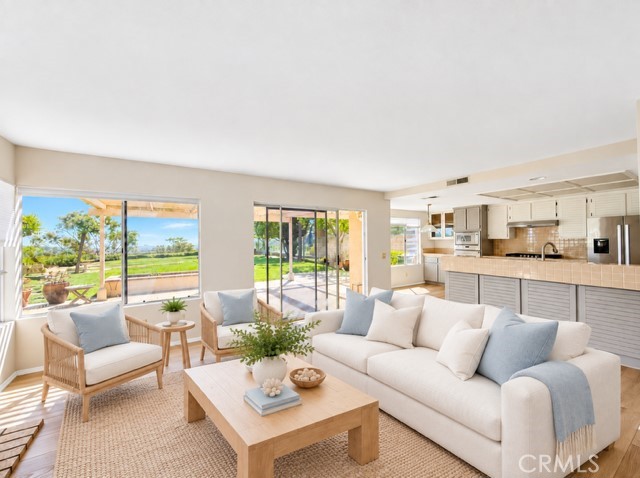 Common Room Open to Kitchen - Virtually staged - 30382 Anamonte, Laguna Niguel CA 92677 - photo 10