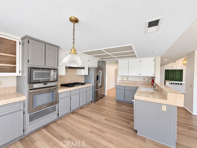 Views and Natural Light Welcome You to the Kitchen - 30382 Anamonte, Laguna Niguel CA 92677 - photo 11