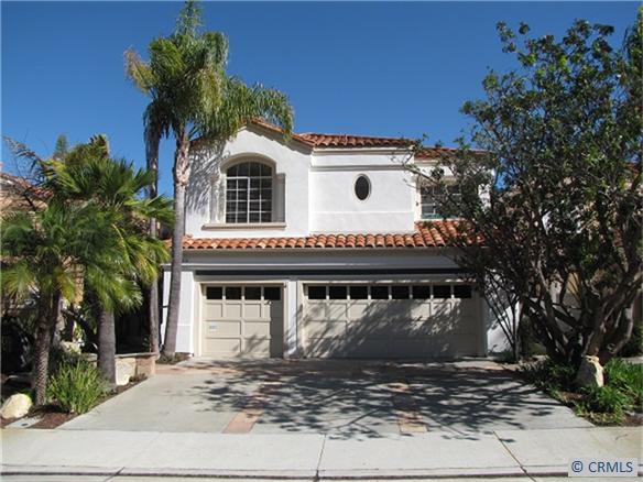 Great curb appeal. Beautiful lava rock fountain on the left as you approach the front door. - 30776 BELLE MAISON, Laguna Niguel CA 92677 - photo 1