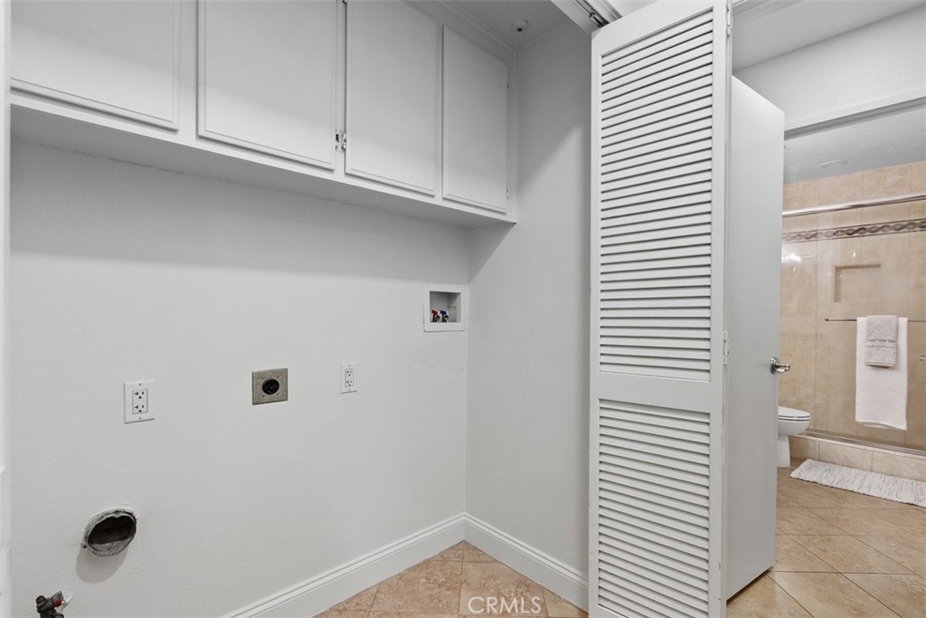 Laundry Closet - 30902 Clubhouse Drive 13B, Laguna Niguel CA 92677 - photo 16