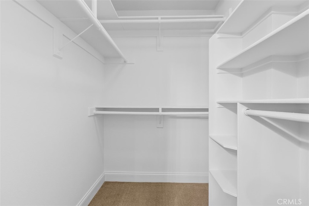 Primary Walk-In Closet - 30902 Clubhouse Drive 13B, Laguna Niguel CA 92677 - photo 21