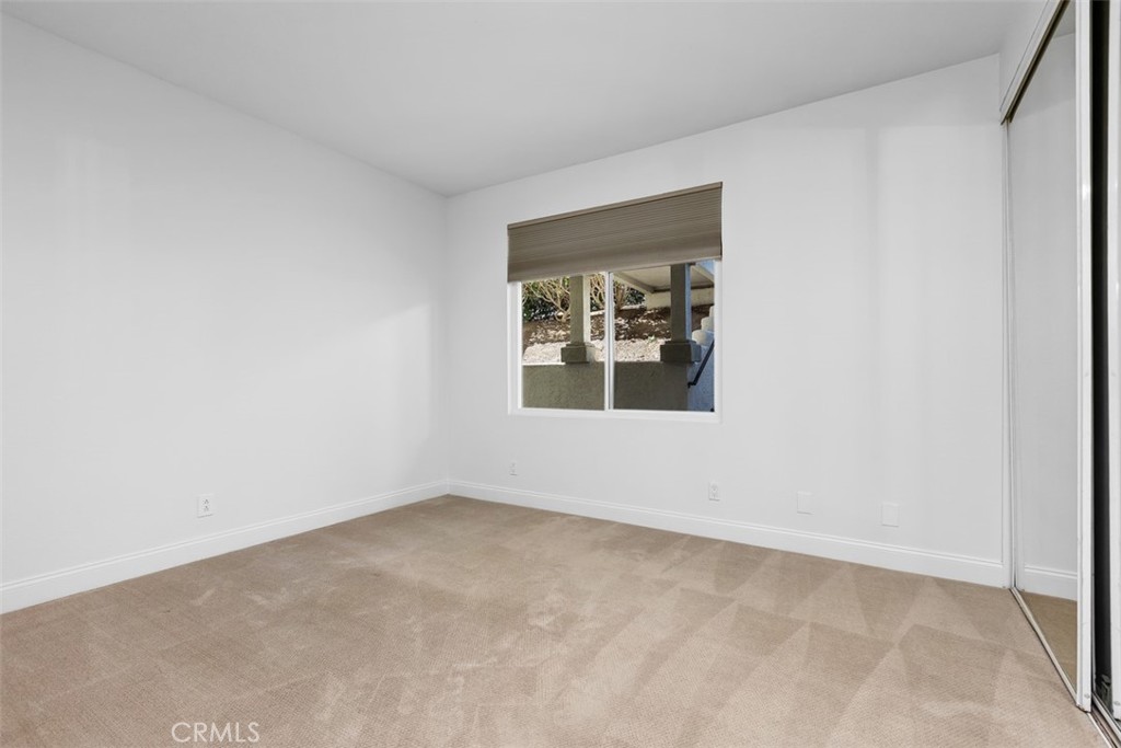 Secondary Bedroom - 30902 Clubhouse Drive 13B, Laguna Niguel CA 92677 - photo 22