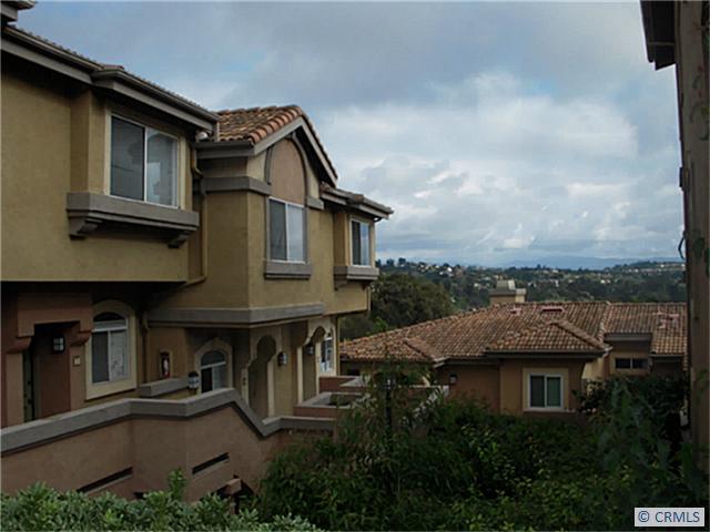 Great Private end unit with sweeping views! Garage, permitted parking and plenty of guest parking too! - 30902 CLUBHOUSE Drive 20D, Laguna Niguel CA 92677 - photo 1