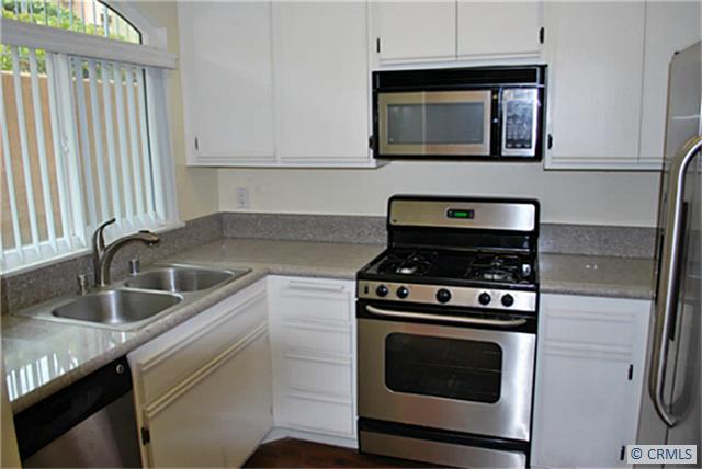 Upgraded Kitchen - 30902 CLUBHOUSE Drive 28B, Laguna Niguel CA 92677 - photo 1