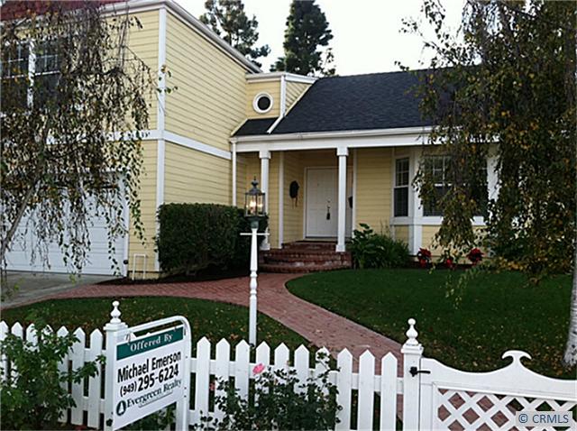 Your yellow Cape Cod style home with the brick walkway and white picket fence awaits you - 31 BARONESS Lane, Laguna Niguel CA 92677 - photo 1