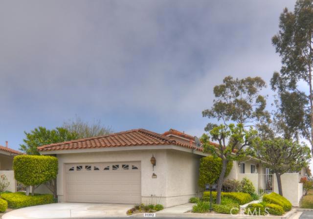 Charming Mediterranean home with private gated yard and patio areas. No one on the right....enjoy the trees. Very privat - 31392 Paseo Del Sol, Laguna Niguel CA 92677 - photo 1
