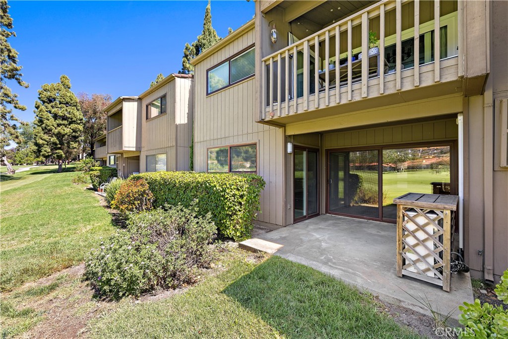 REAR VIEW OF PATIO AREA RIGHT ON THE GOLF COURSE - 31545 E Nine Dr #37A, Laguna Niguel CA 92677 - photo 4