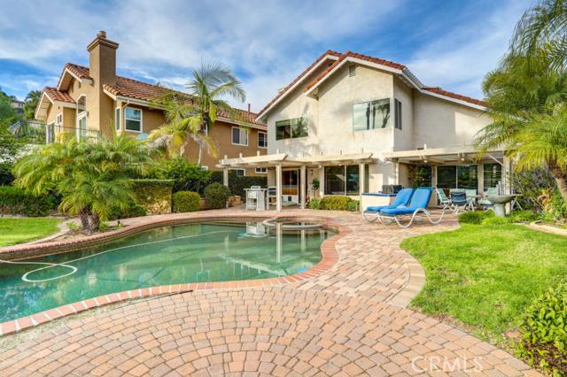 This entertaining and beautiful backyard is the highlight of the home. - 4 Springbrook Road, Laguna Niguel CA 92677 - photo 1