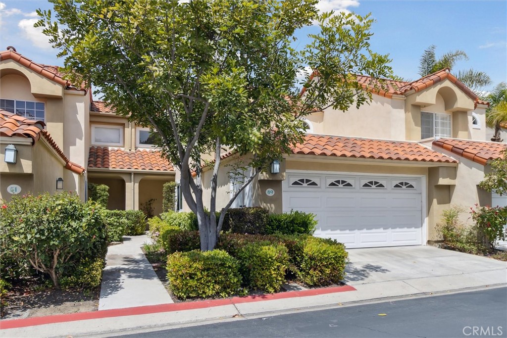 The townhome is tucked away in a secluded, upscale community of Niguel Pointe. - 49 Niguel Pointe Drive 143, Laguna Niguel CA 92677 - photo 1