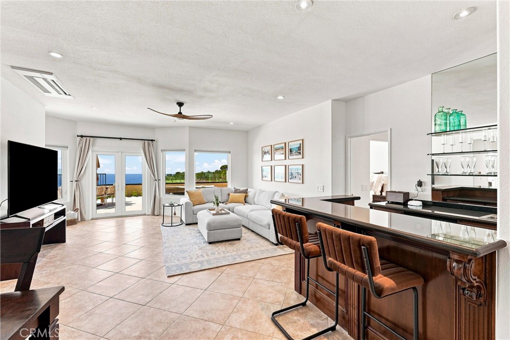 Lower-level family room with full wet bar & gorgeous panoramic views - 6 Cavalier, Laguna Niguel CA 92677 - photo 14