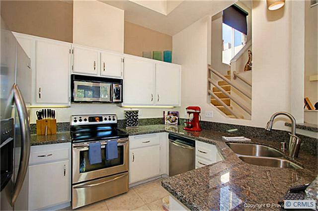 New granite counters in open kitchen offer abundant counter space - 7 DAYTONA, Laguna Niguel CA 92677 - photo 1