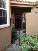 Private front door courtyard with gate. - 70 Chandon, Laguna Niguel CA 92677 - photo 1