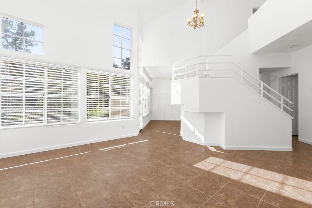 Light and bright vaulted ceiling main living space with fireplace - 79 Shorebreaker Drive, Laguna Niguel CA 92677 - photo 1