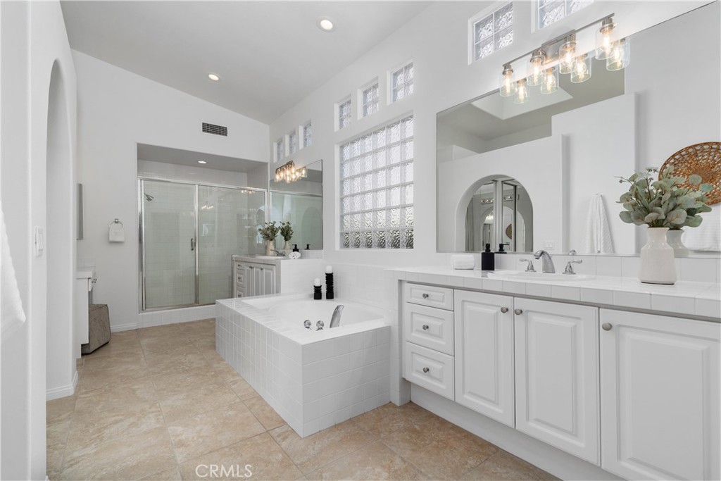 Spacious primary bathroom with soaking tub and shower - 8 Chantonnay, Laguna Niguel CA 92677 - photo 25