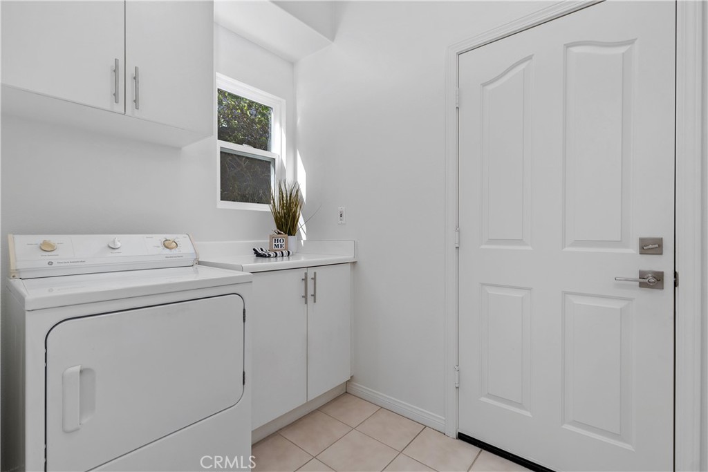 Laundry room with Sink (not shown) and lots of cabinetry! - 8 Chantonnay, Laguna Niguel CA 92677 - photo 38