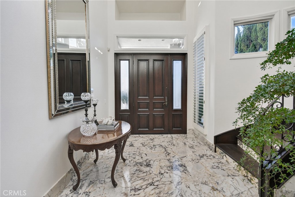 Exquisite Calacatta Viola marble flooring in foyer - 9 Gray Stone Way, Laguna Niguel CA 92677 - photo 5