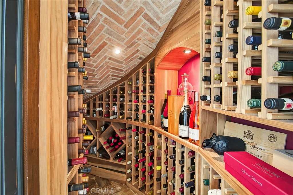Refrigerated Wine Cellar with reclaimed Tuscan tile and custom redwood racks - 9 Gray Stone Way, Laguna Niguel CA 92677 - photo 8