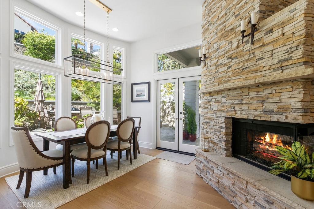 Huge breakfast room and three-sided fireplace - 9 Gray Stone Way, Laguna Niguel CA 92677 - photo 12