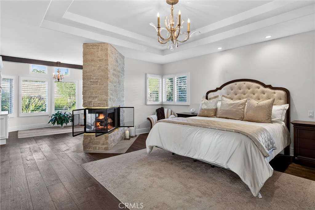 Gorgeous primary bedroom with third fireplace - 9 Gray Stone Way, Laguna Niguel CA 92677 - photo 30