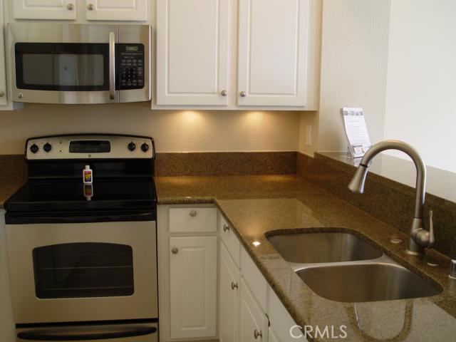 Updated Kitchen with Plenty of Counter Space and Storage - 95 Dover Place, Laguna Niguel CA 92677 - photo 1