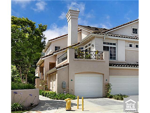 Great curb appeal with driveway access and attached garage! No one above you! - 95 Shorebreaker Drive, Laguna Niguel CA 92677 - photo 1