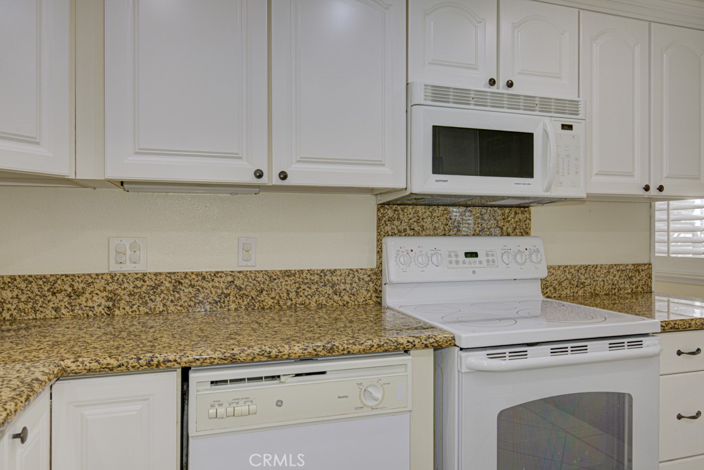 Another view of the kitchen. - 2 Via Castilla E, Laguna Woods CA 92637 - photo 10