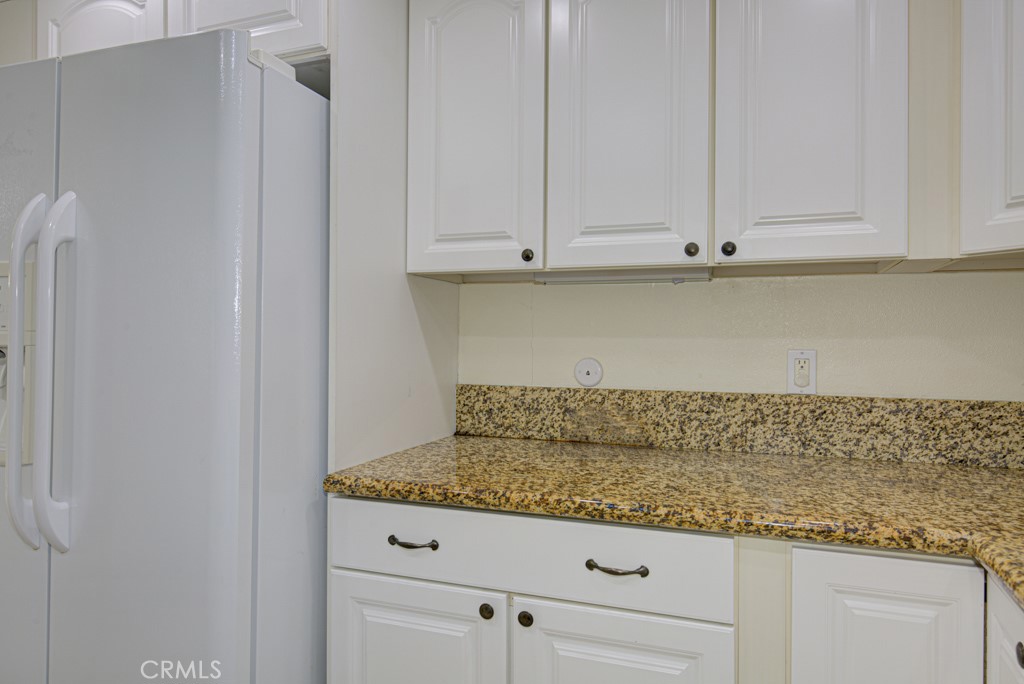 Another view of the kitchen. - 2 Via Castilla E, Laguna Woods CA 92637 - photo 11