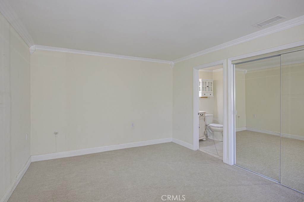 Another view of the primary bedroom suite. - 2 Via Castilla E, Laguna Woods CA 92637 - photo 22