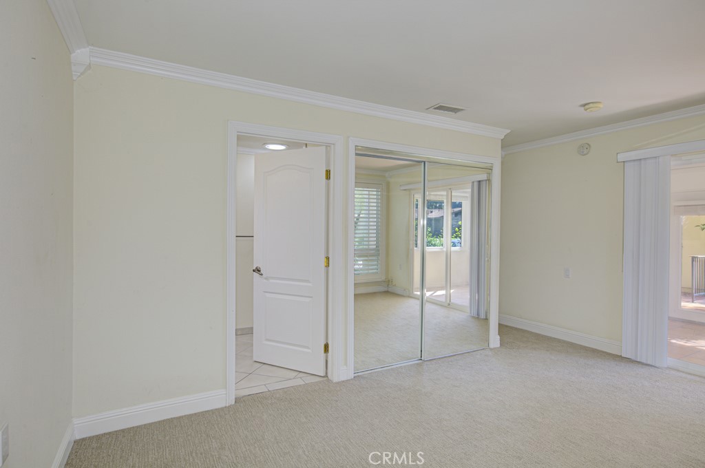 Another view of the primary bedroom suite. - 2 Via Castilla E, Laguna Woods CA 92637 - photo 23
