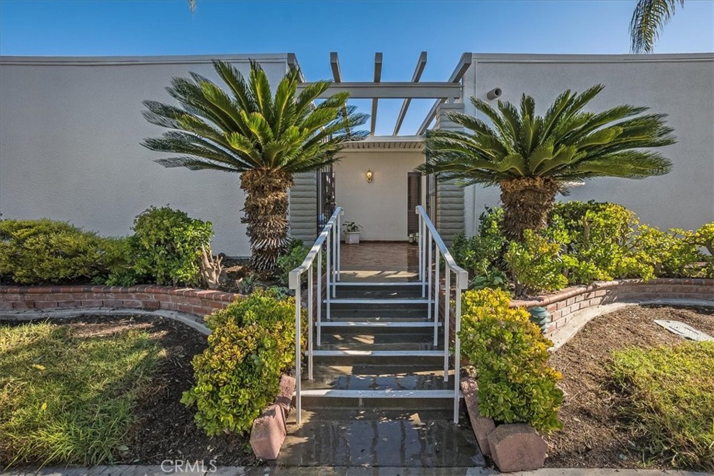 Welcome to 2002 Via Mariposa D, an upgraded villa in Laguna Woods with only 5 exterior steps to access. No stairs inside - 2002 Via Mariposa D, Laguna Woods CA 92637 - photo 1