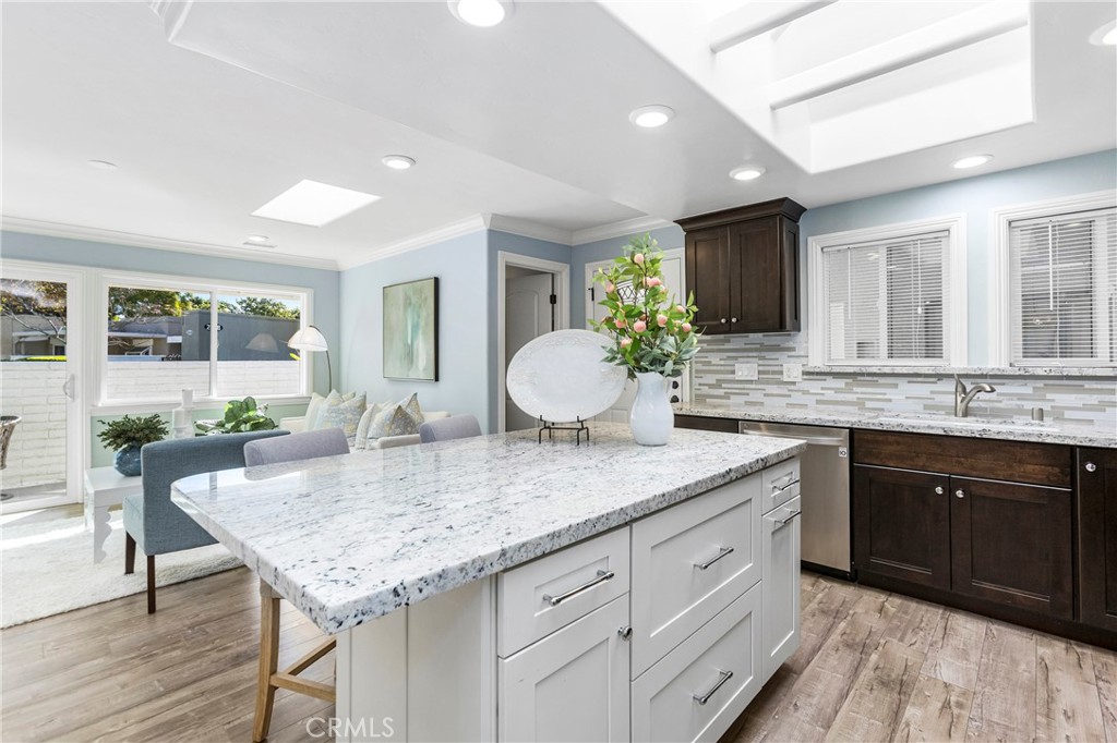 The Kitchen opens the the spacious living room and also the large walk in pantry - 2046 Via Mariposa E Unit P, Laguna Woods CA 92637 - photo 1