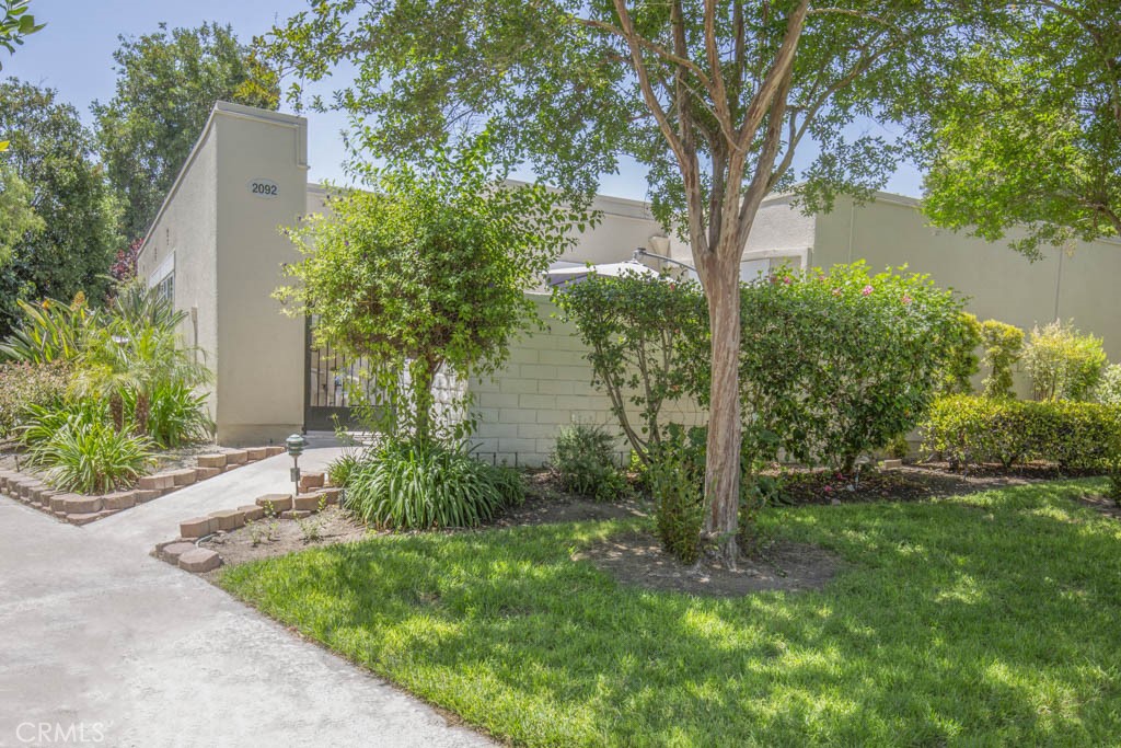 Welcome to 2092-C Ronda Granada - a single-level two-bedroom, two-bath NEW VALENCIA residence in the Laguna Woods senior - 2092 Ronda Granada C, Laguna Woods CA 92637 - photo 1