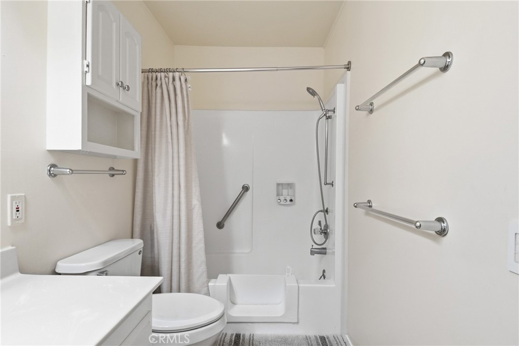 Bathroom has gate for low step in. - 2132 Via Puerta E, Laguna Woods CA 92637 - photo 19