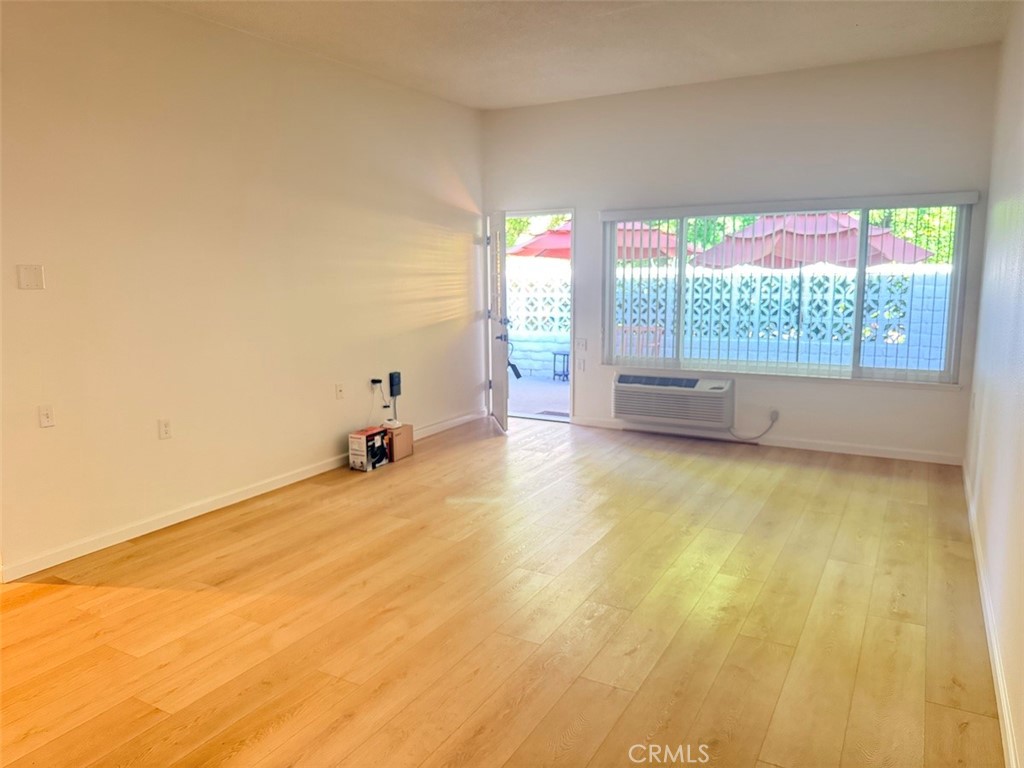 Living room looking out to the patio - 2149 Ronda Granada F, Laguna Woods CA 92637 - photo 6